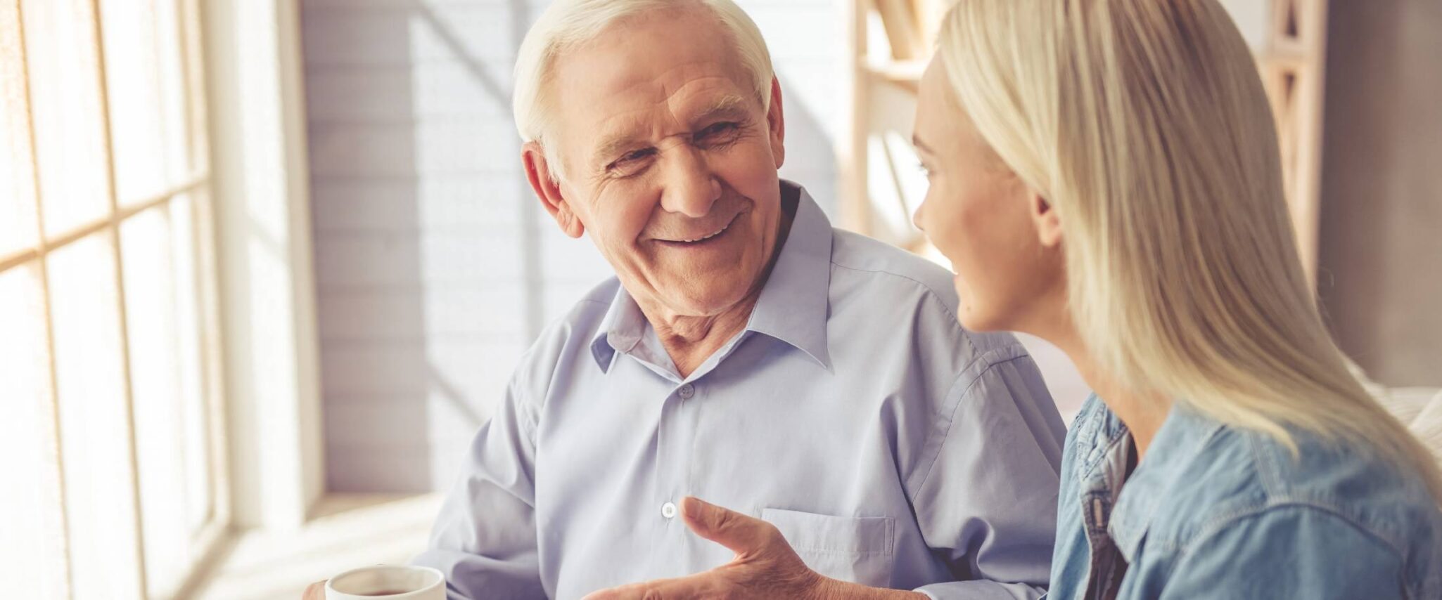 senior and daughter talking