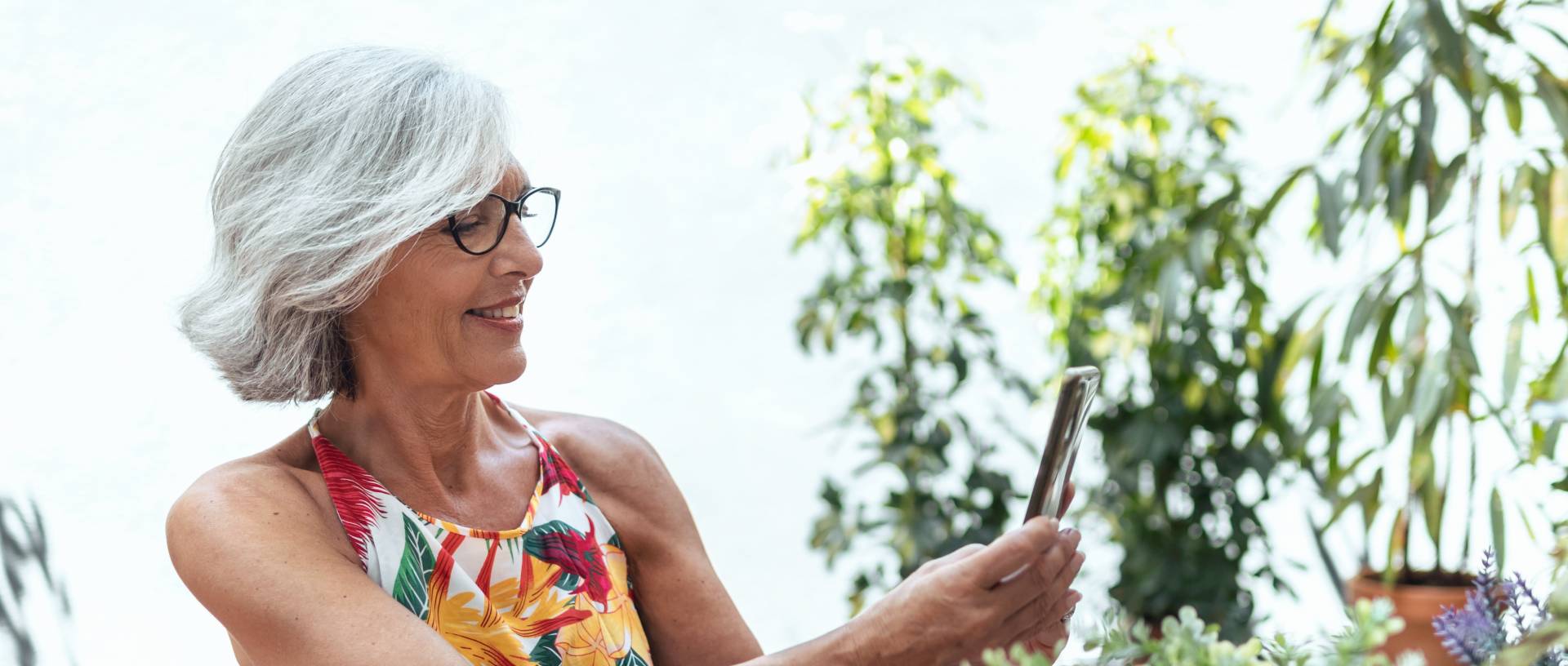 senior lady looking at her phone