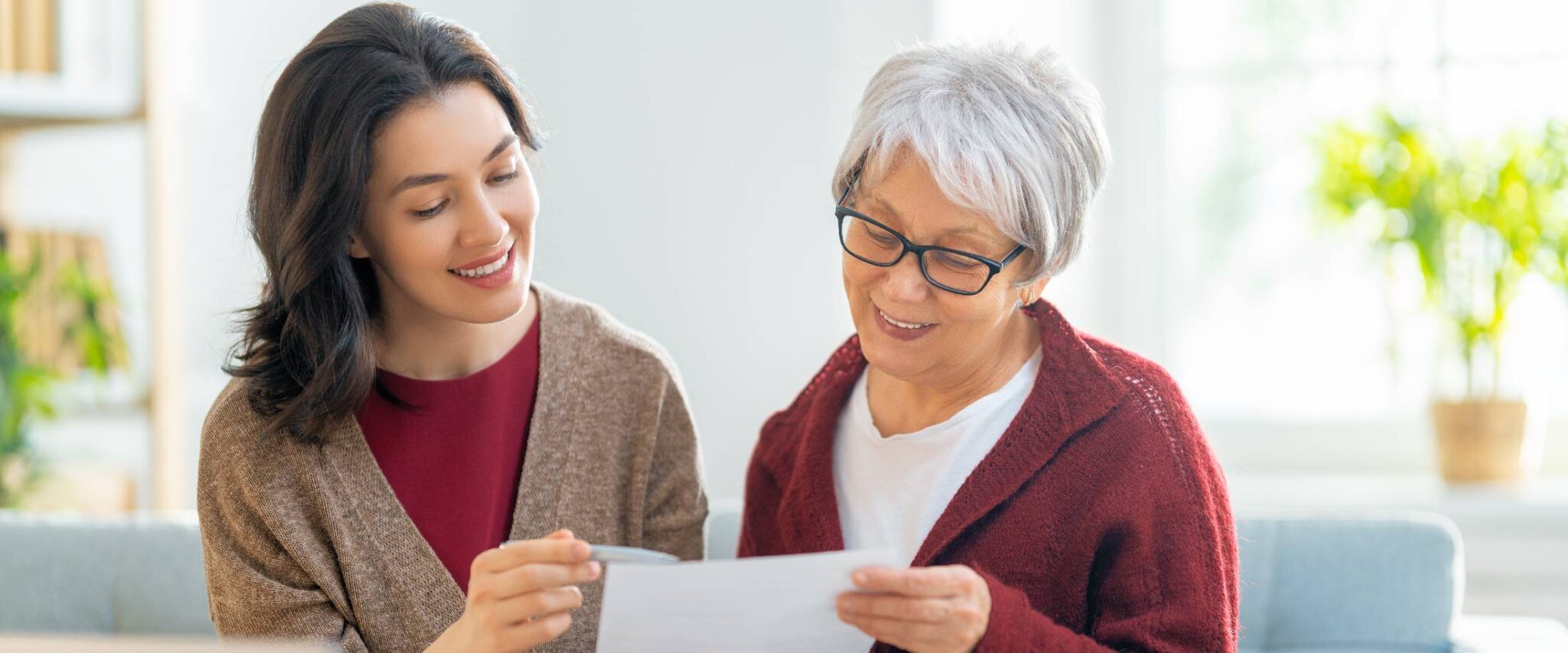 happy senior woman spending time with her daughter