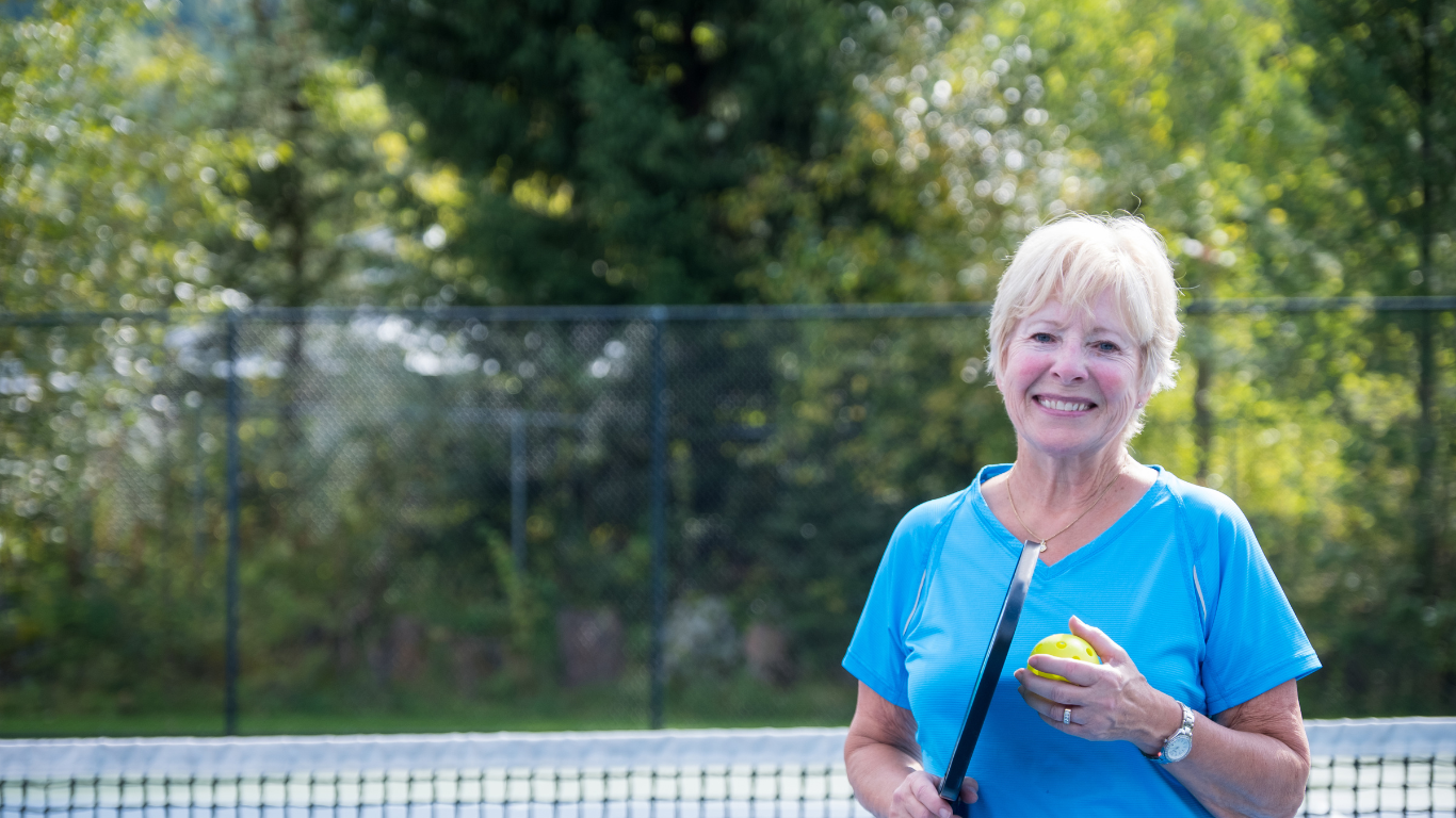 Active senior woman enjoying pickleball