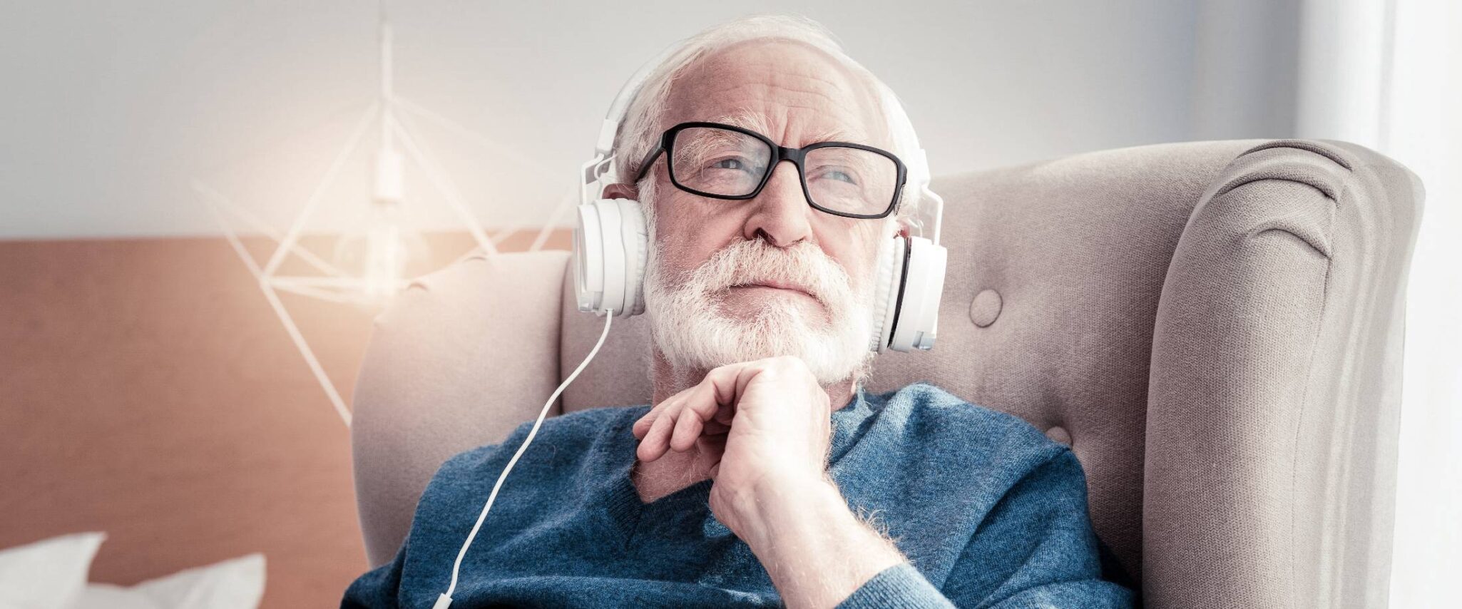 man deep in thought with headphones on