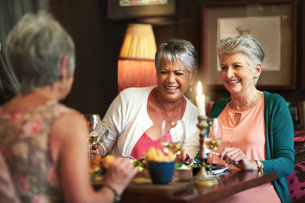 seniors enjoying wine