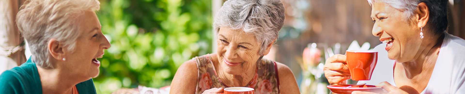 happy senior women laughing