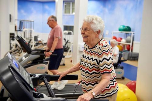 seniors exercising on treadmills